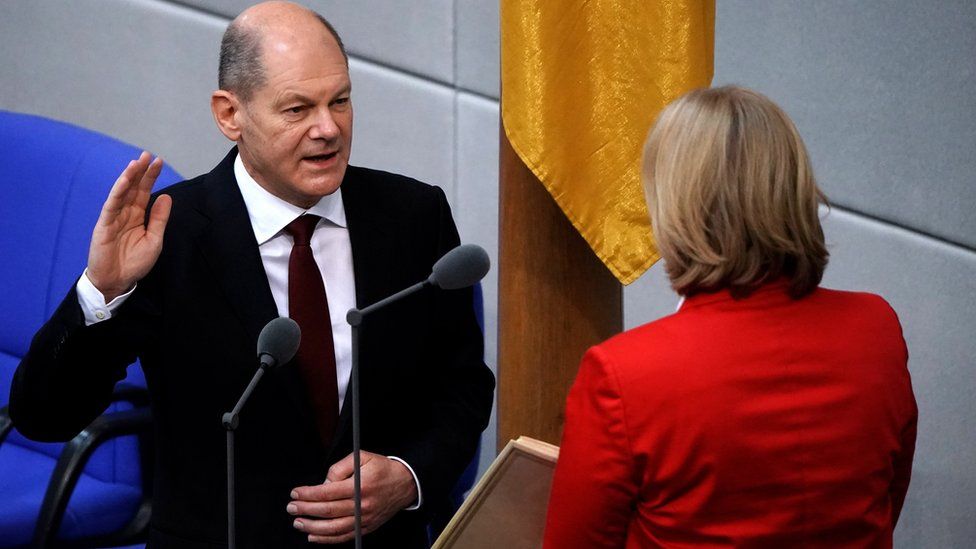 Germany’s Olaf Scholz takes over from Merkel as chancellor